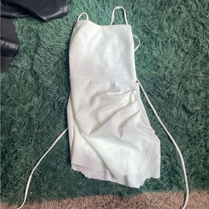 Backless white mini tie back dress